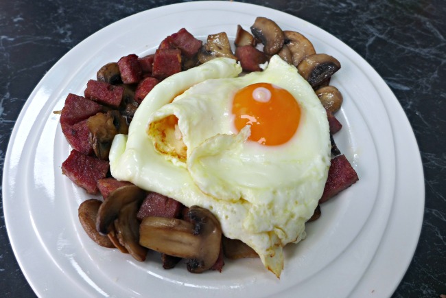 Keto Breakfast of salami, mushrooms and a fried egg