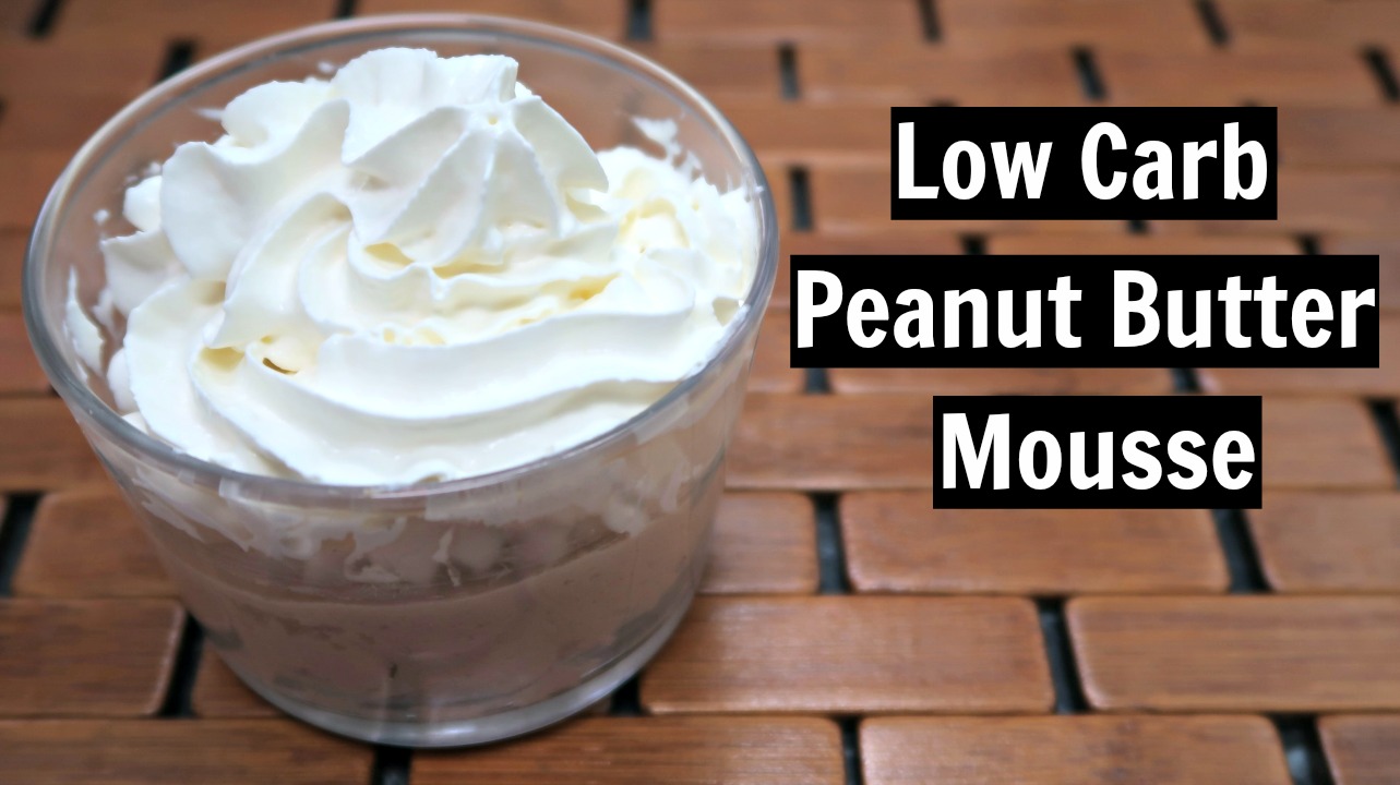 Bowl of Low Carb Peanut Butter Mousse Recipe topped with whipped cream