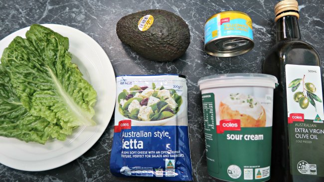 Keto friendly foods - lettuce, avocado, feta, sour cream, tuna and olive oil