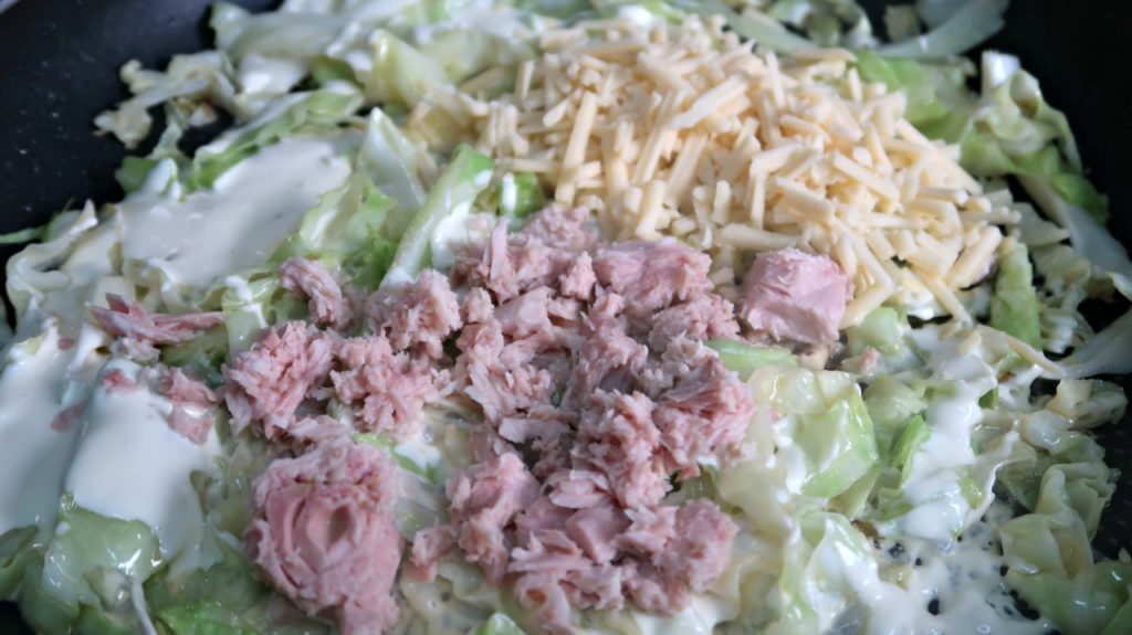 Low carb cabbage noodles topped with tuna and cheese