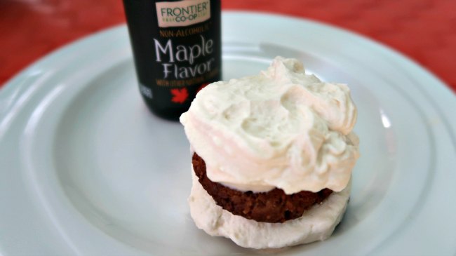 Keto cookie covered in maple whipped cream