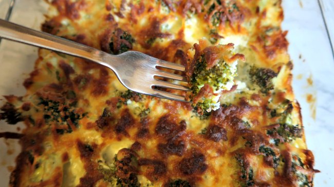 Broccoli Casserole Dish with a fork of broccoli