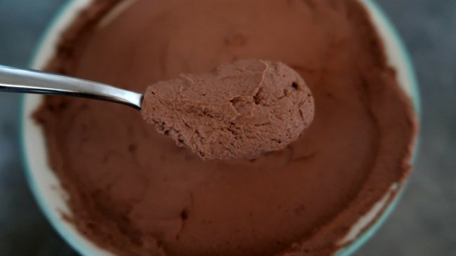 Spoon of keto chocolate mousse dessert