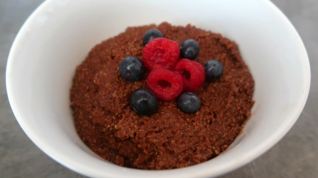 Chocolate quinoa porridge with berries