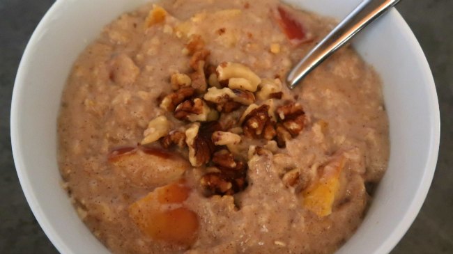 Apple and cinnamon winter breakfast oatmeal