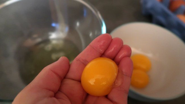Separating eggs by hand