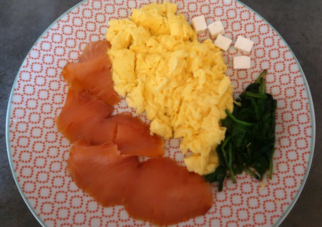 Smoked salmon and scrambled eggs breakfast