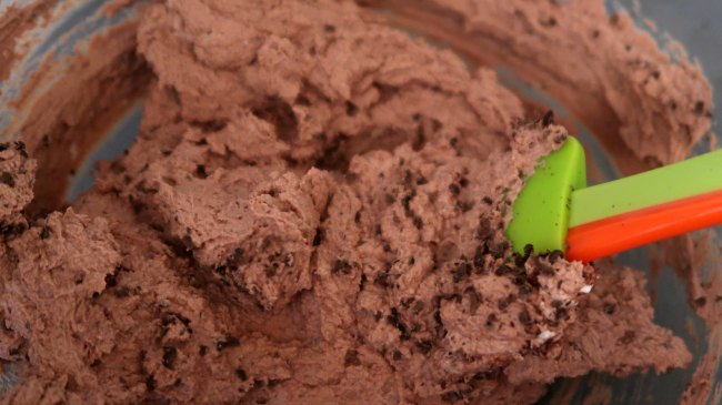 Folding in the grated chocolate