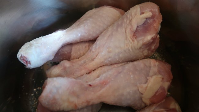 Chicken legs browning in the saucepan