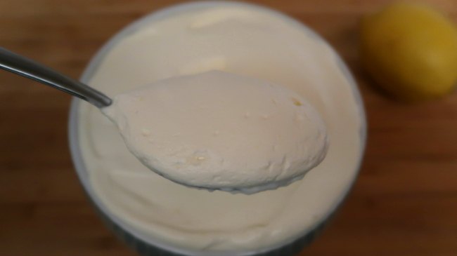 Spoon of lemon cheesecake mousse