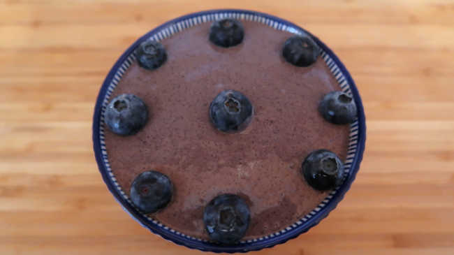 Bowl topped with blueberries