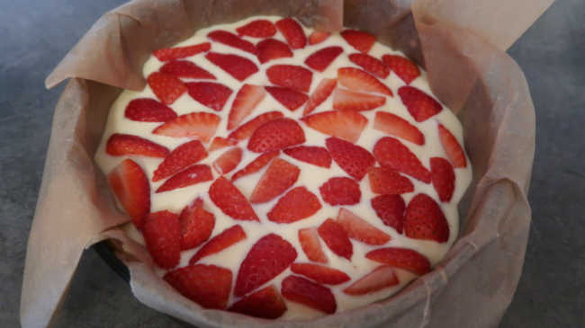 Strawberry Ricotta Cake Recipe Batter topped with strawberries