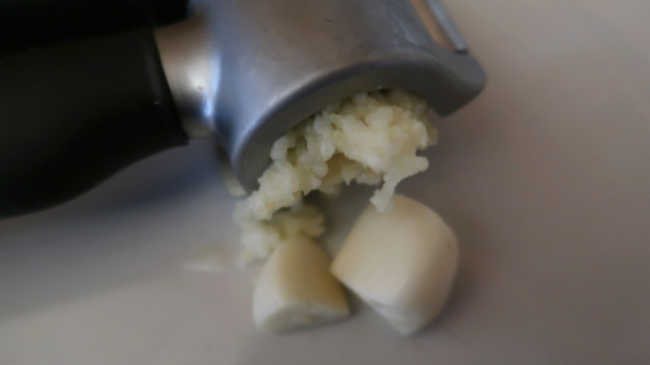 Crushing garlic cloves