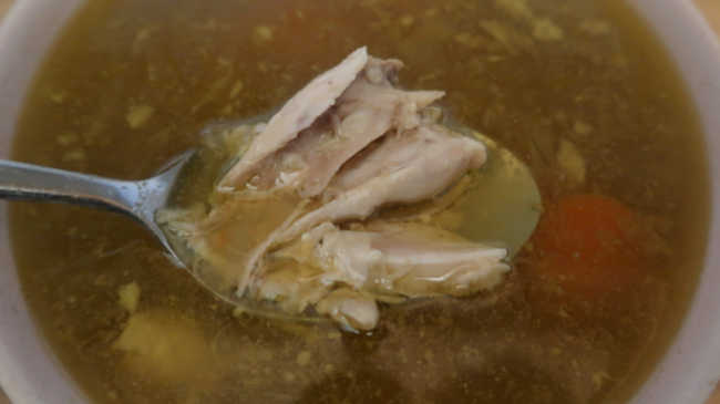 Spoon of Chicken Soup With Wings