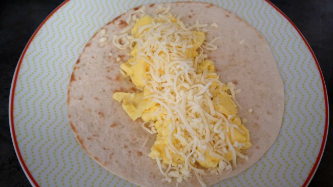 Easy breakfast burritos with scrambled eggs and cheese