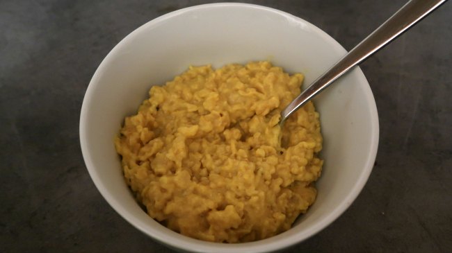Healthy bowl of golden milk porridge