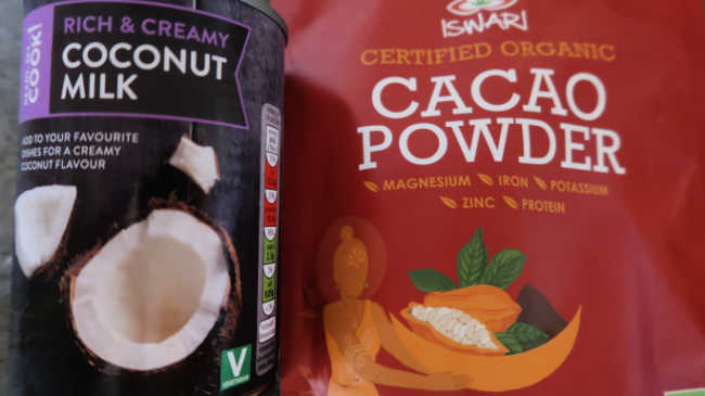 Can of coconut milk and natural cocoa powder