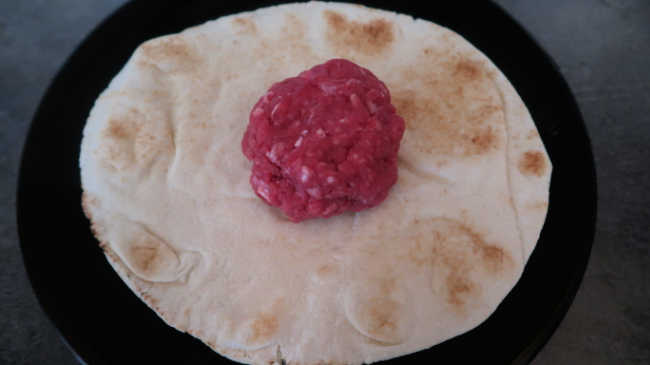 Ground meat in the flour tortilla