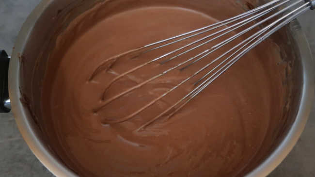 Whisking the ingredients together to a creamy texture