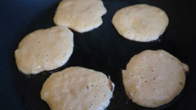 Bubbles on the surface of the banana protein pancakes before flipping