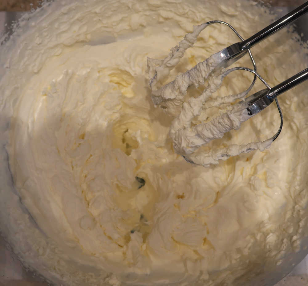 Whipping cream in a large bowl