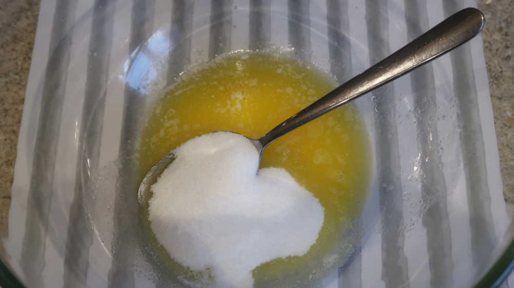 Adding the sugar and vanilla
